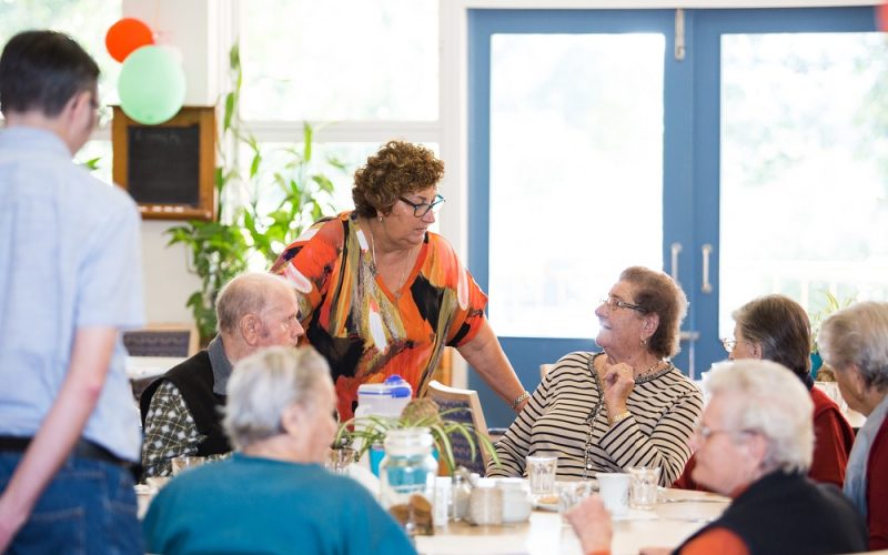 Staff with clients at Seniors Day Club