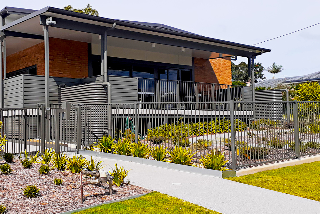 A worker and client having a laugh